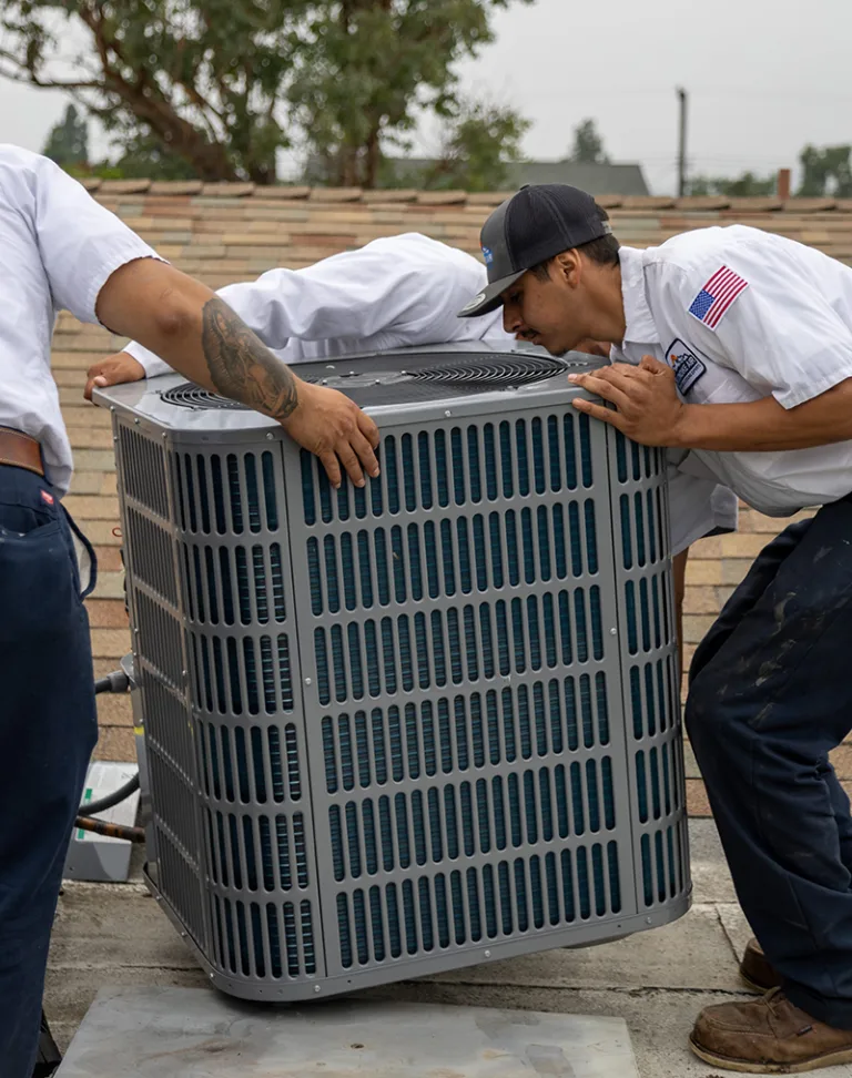 Contractors Replacing HVAC Unit