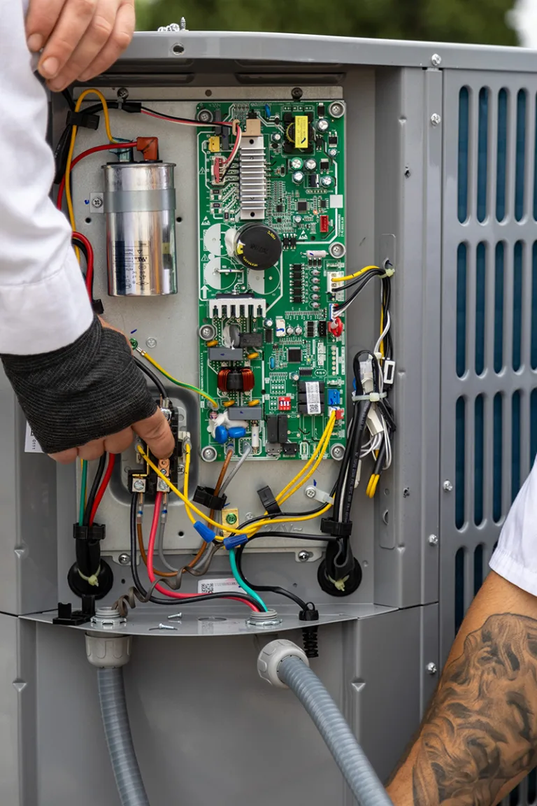 HVAC Technician Repairing AC for Optimal Efficiency