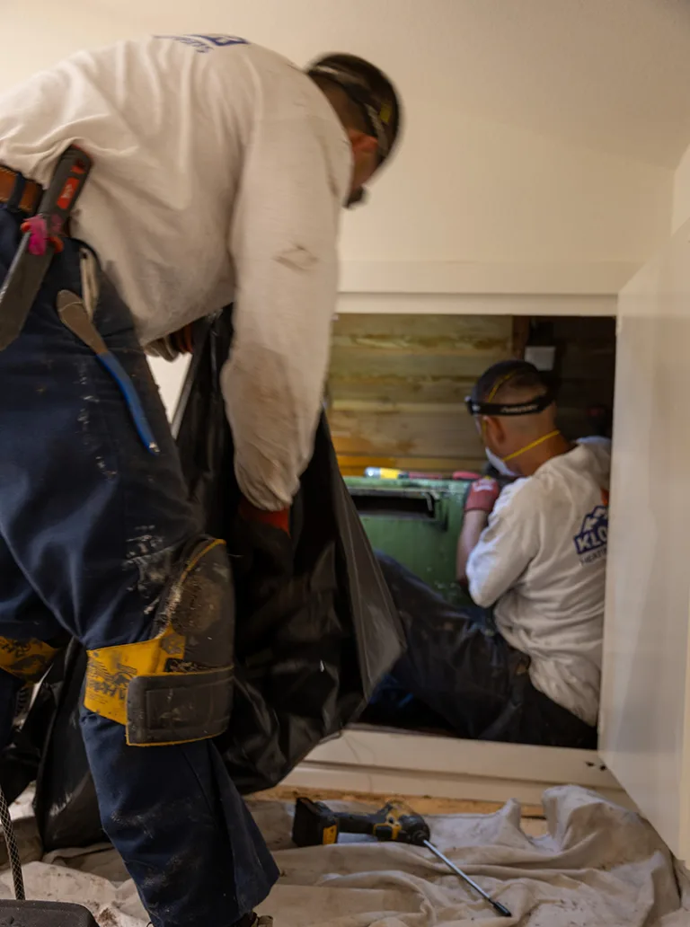 Technician Checking Air Duct for Improving Air Quality