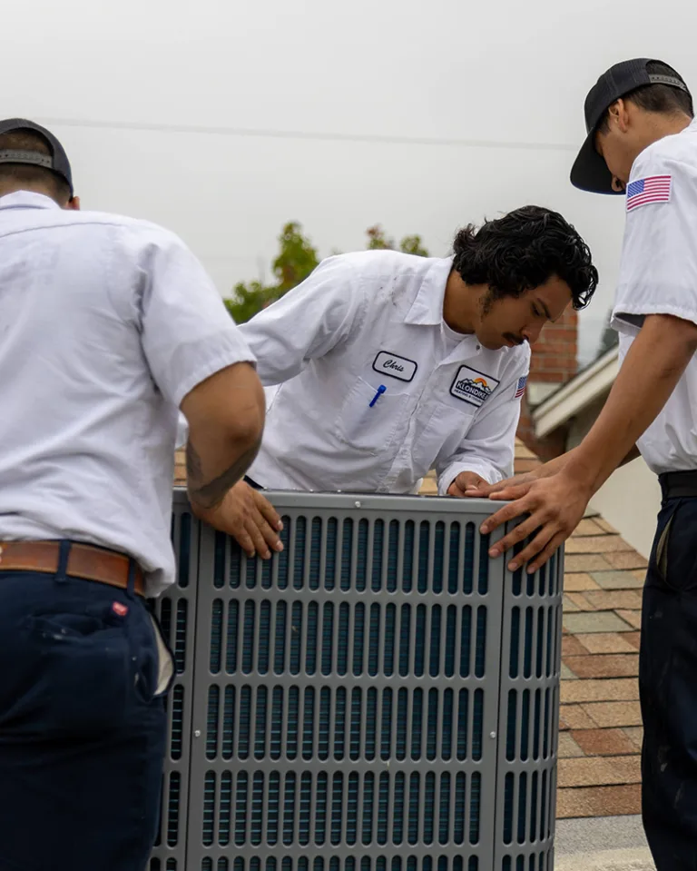 Professional Technicians Installing Home Heating System