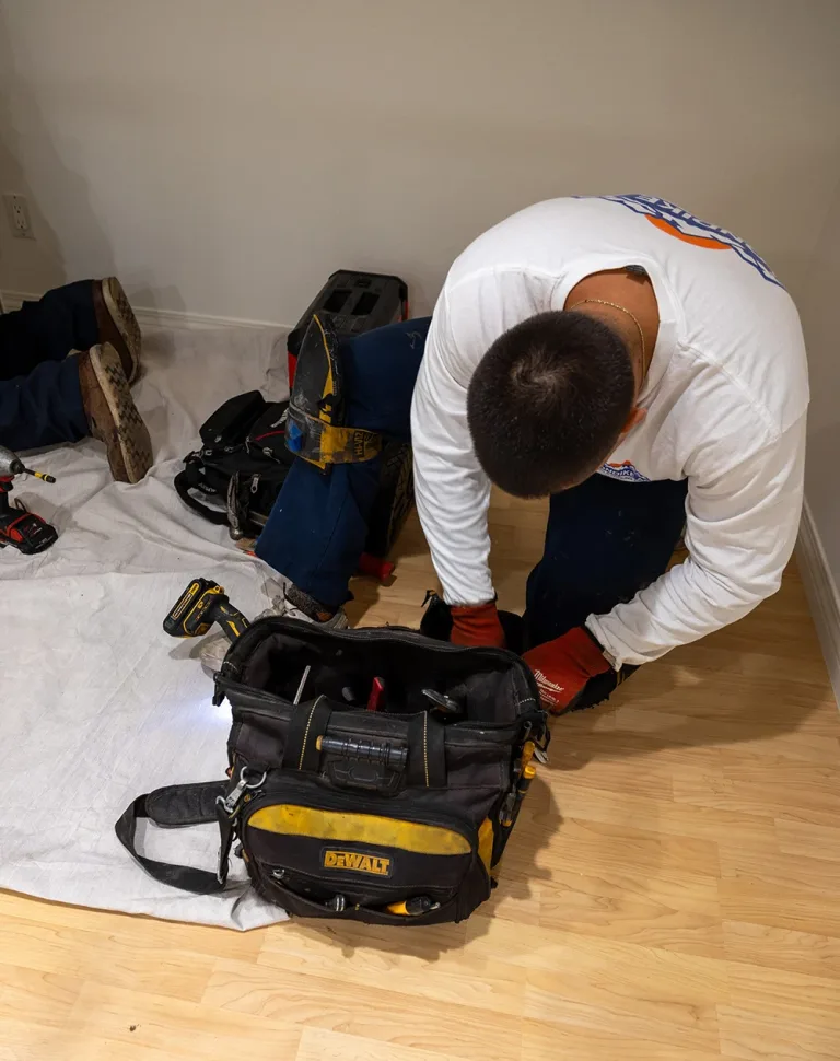 Technician Preparing for AC Cleaning